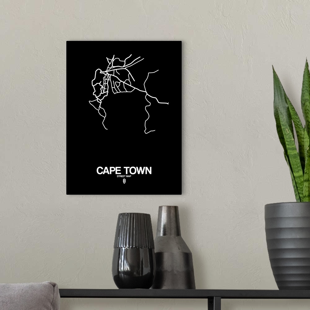 A modern room featuring Minimalist art map of the city streets of Cape Town in black and white.