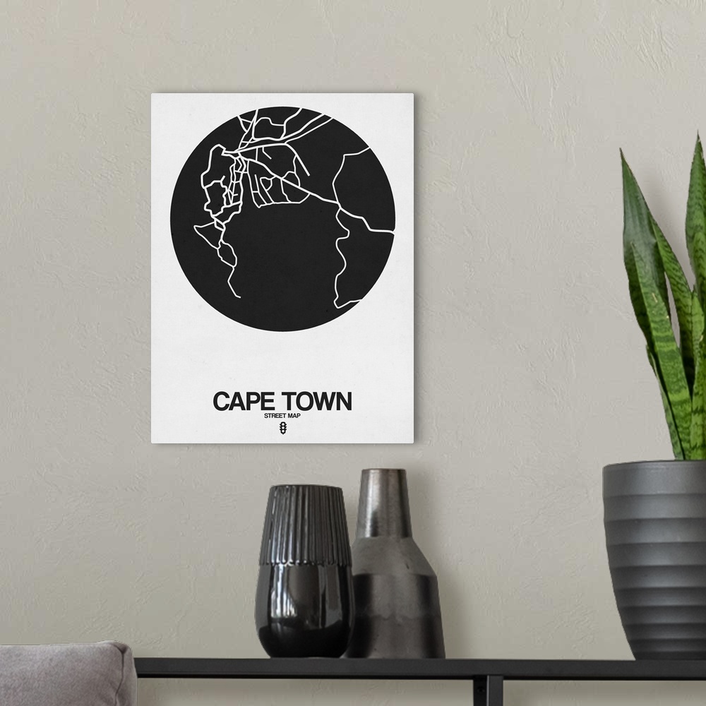 A modern room featuring Minimalist art map of the city streets of Cape Town in white and black.