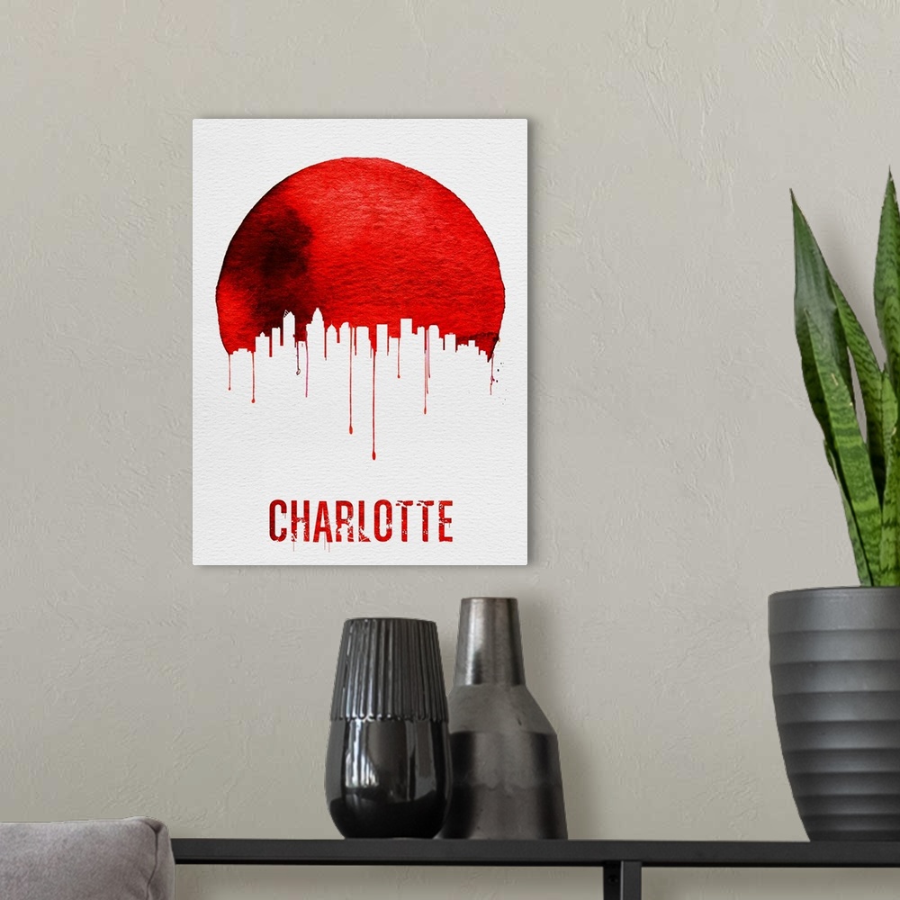 A modern room featuring Contemporary watercolor artwork of the Charlotte city skyline, in silhouette.