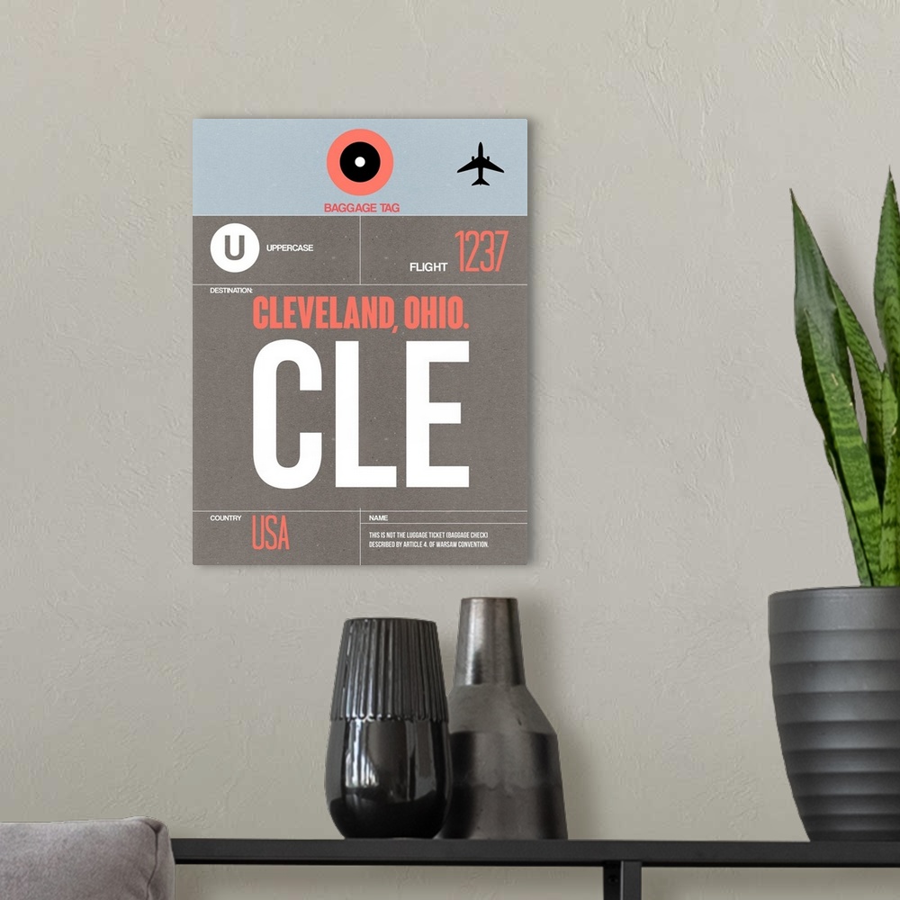 A modern room featuring CLE Cleveland Luggage Tag II