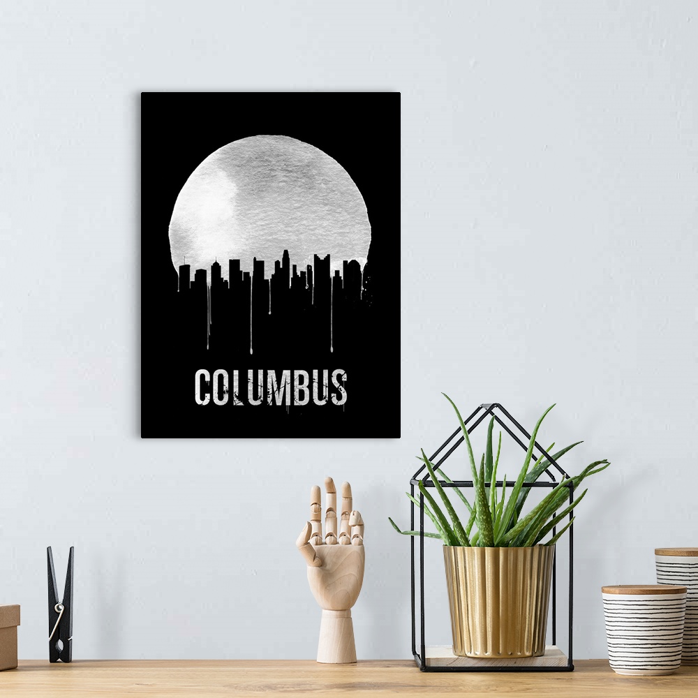 A bohemian room featuring Contemporary watercolor artwork of the Columbus city skyline, in silhouette.