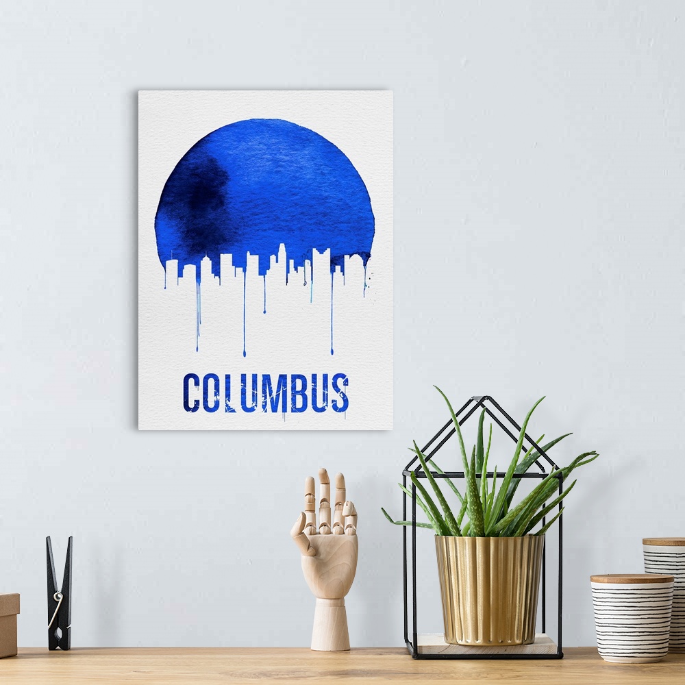 A bohemian room featuring Contemporary watercolor artwork of the Columbus city skyline, in silhouette.