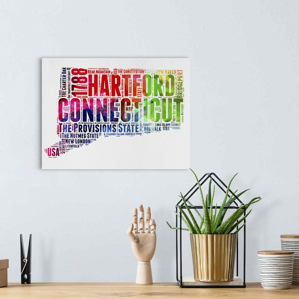 A bohemian room featuring Watercolor typography art map of the US state Connecticut.