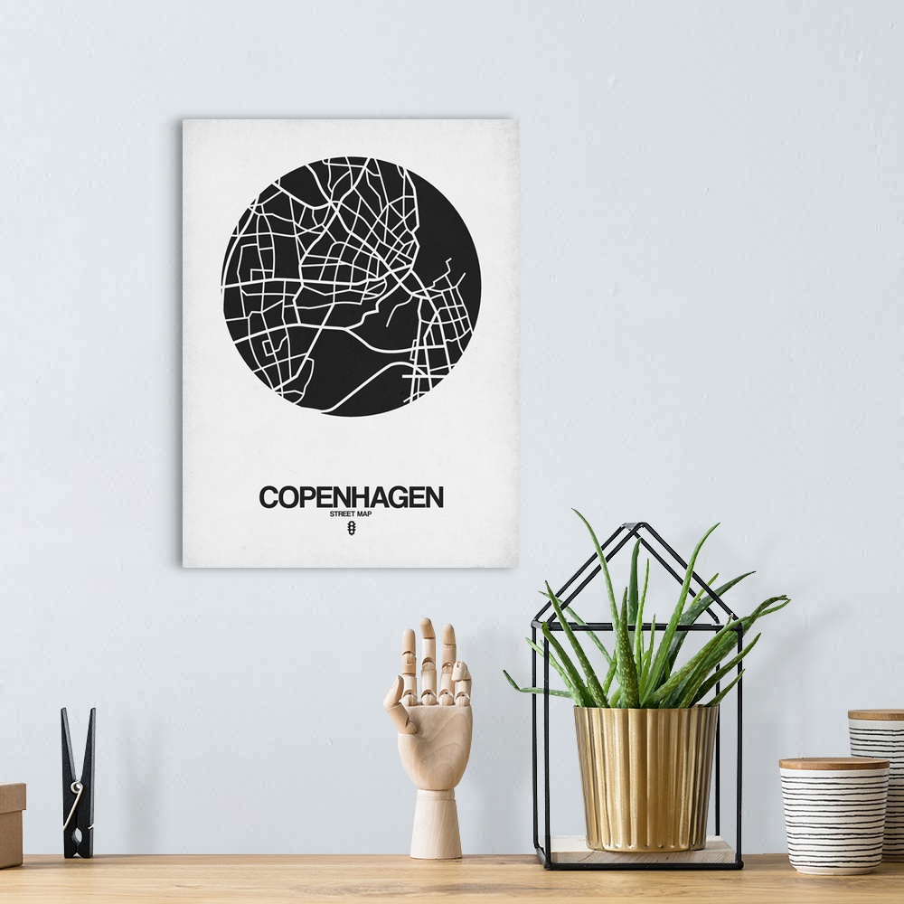 A bohemian room featuring Minimalist art map of the city streets of Copenhagen in white and black.
