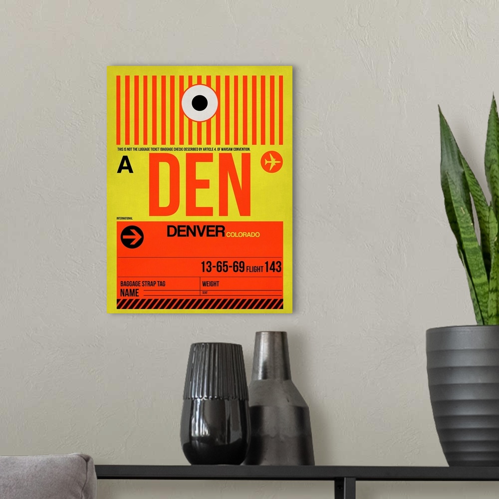 A modern room featuring DEN Denver Luggage Tag I