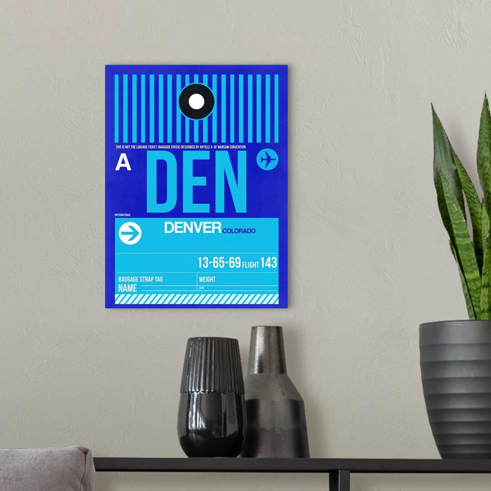 A modern room featuring DEN Denver Luggage Tag II