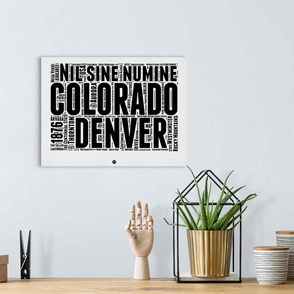 A bohemian room featuring Typography art map of the US state Denver.