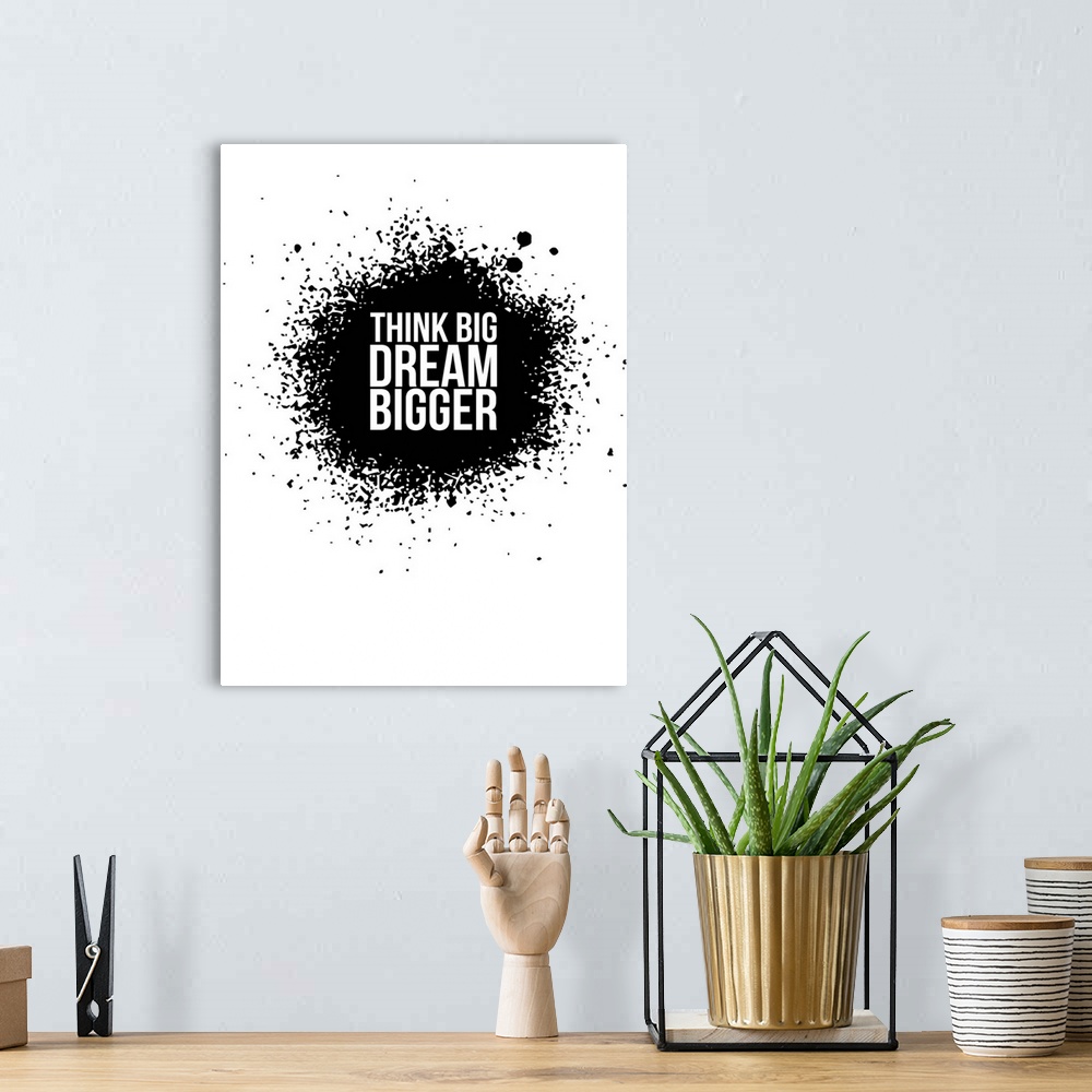 A bohemian room featuring Typography poster art using high contrast and paint splatter.