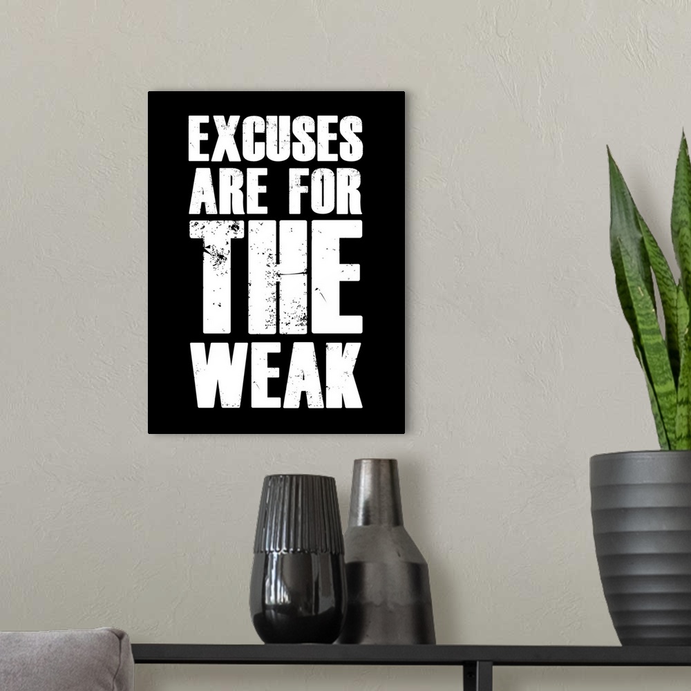 A modern room featuring Excuses Are For The Weak