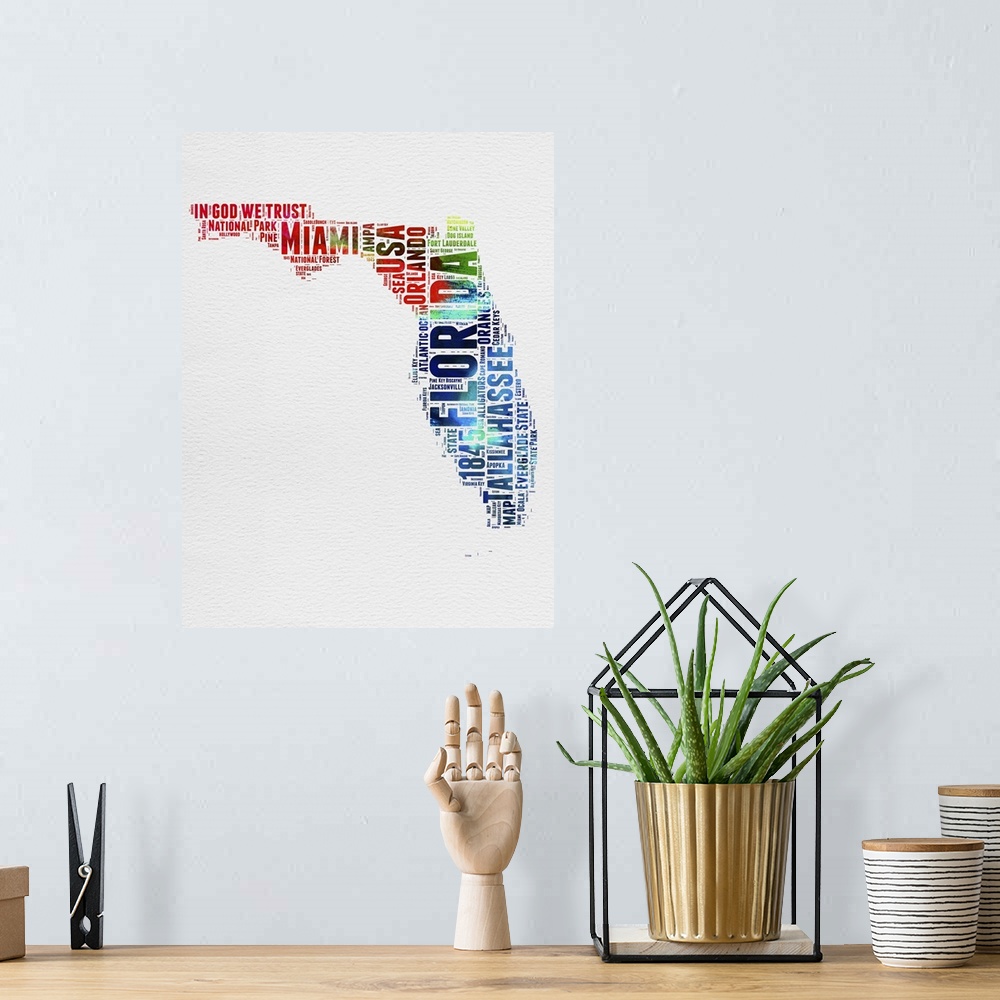 A bohemian room featuring Watercolor typography art map of the US state Florida.