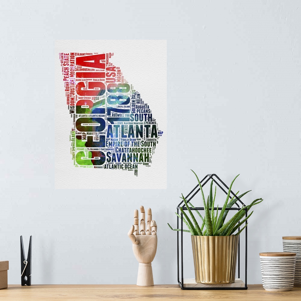 A bohemian room featuring Watercolor typography art map of the US state Georgia.