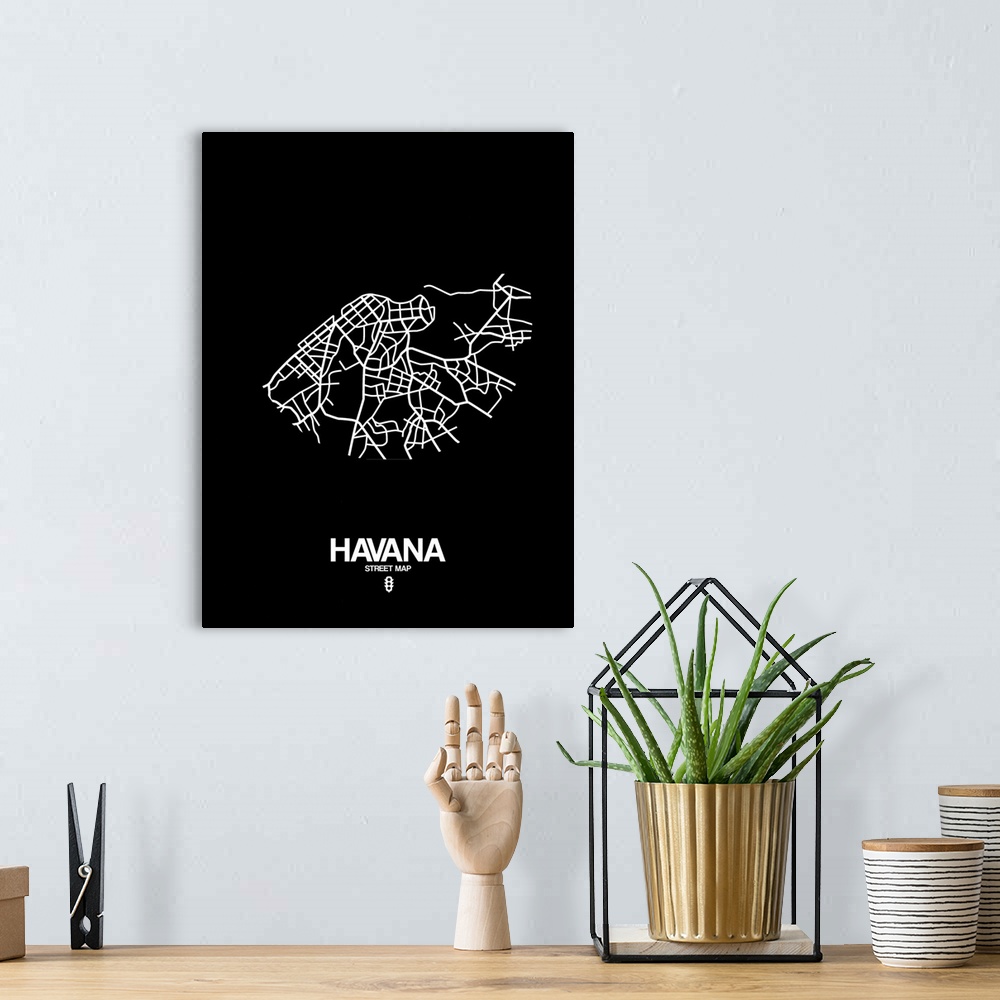 A bohemian room featuring Minimalist art map of the city streets of Havana in black and white.