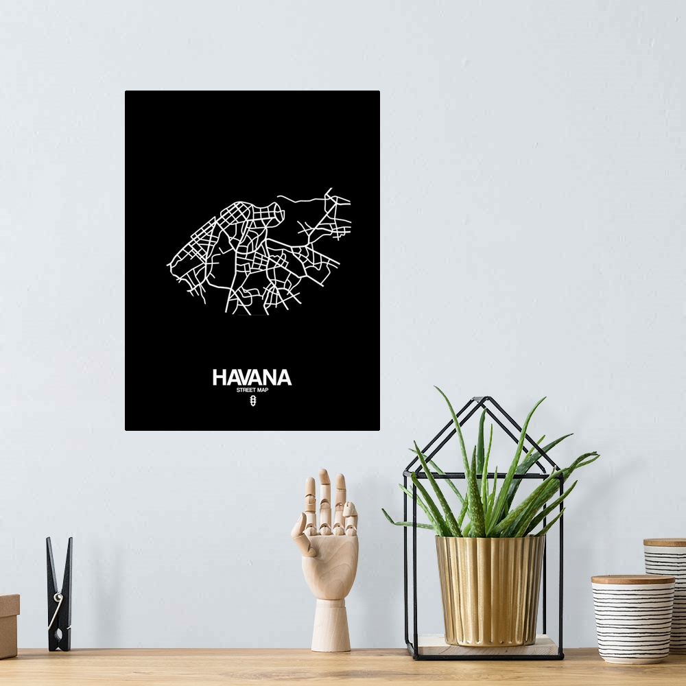 A bohemian room featuring Minimalist art map of the city streets of Havana in black and white.