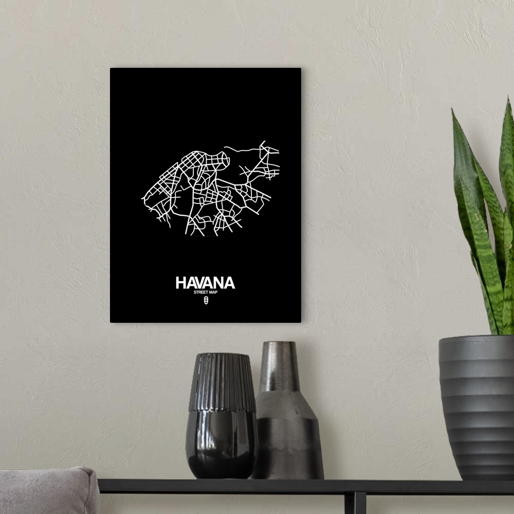 A modern room featuring Minimalist art map of the city streets of Havana in black and white.