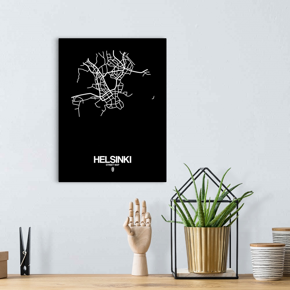 A bohemian room featuring Minimalist art map of the city streets of Helsinki in black and white.