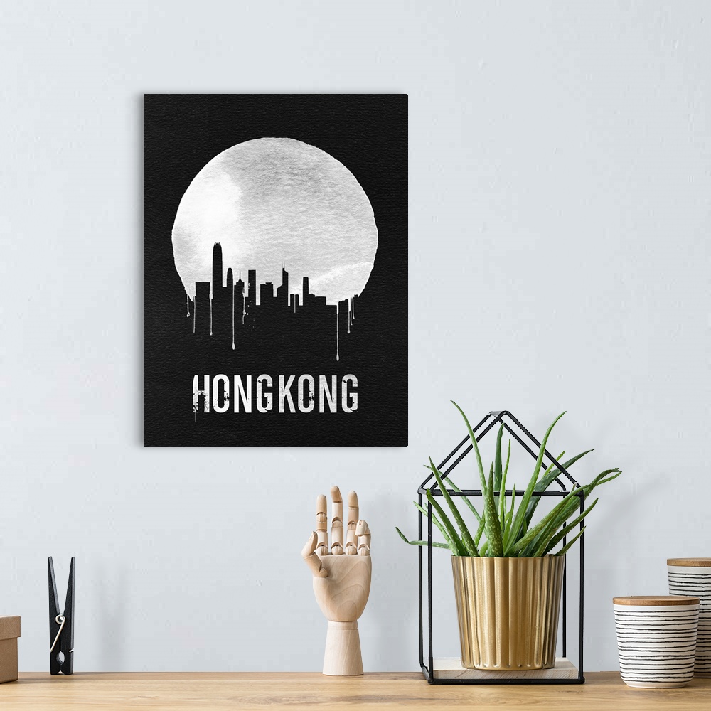 A bohemian room featuring Contemporary watercolor artwork of the Hong Kong city skyline, in silhouette.