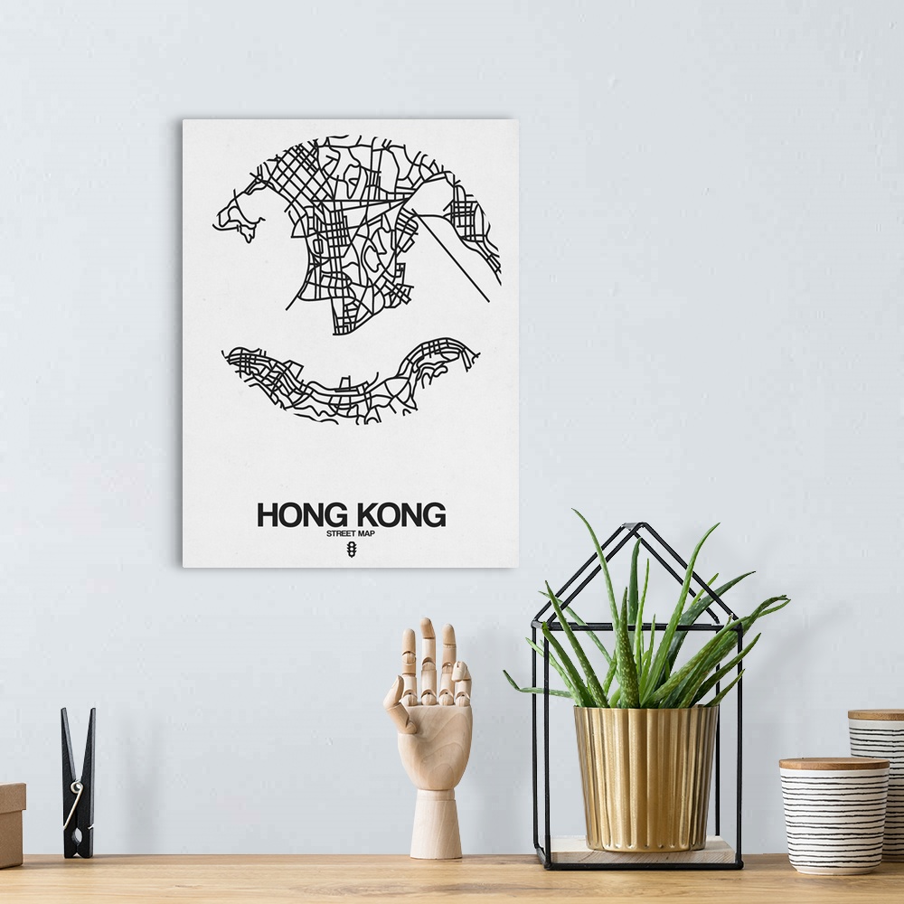 A bohemian room featuring Minimalist art map of the city streets of Hong Kong in white and black.