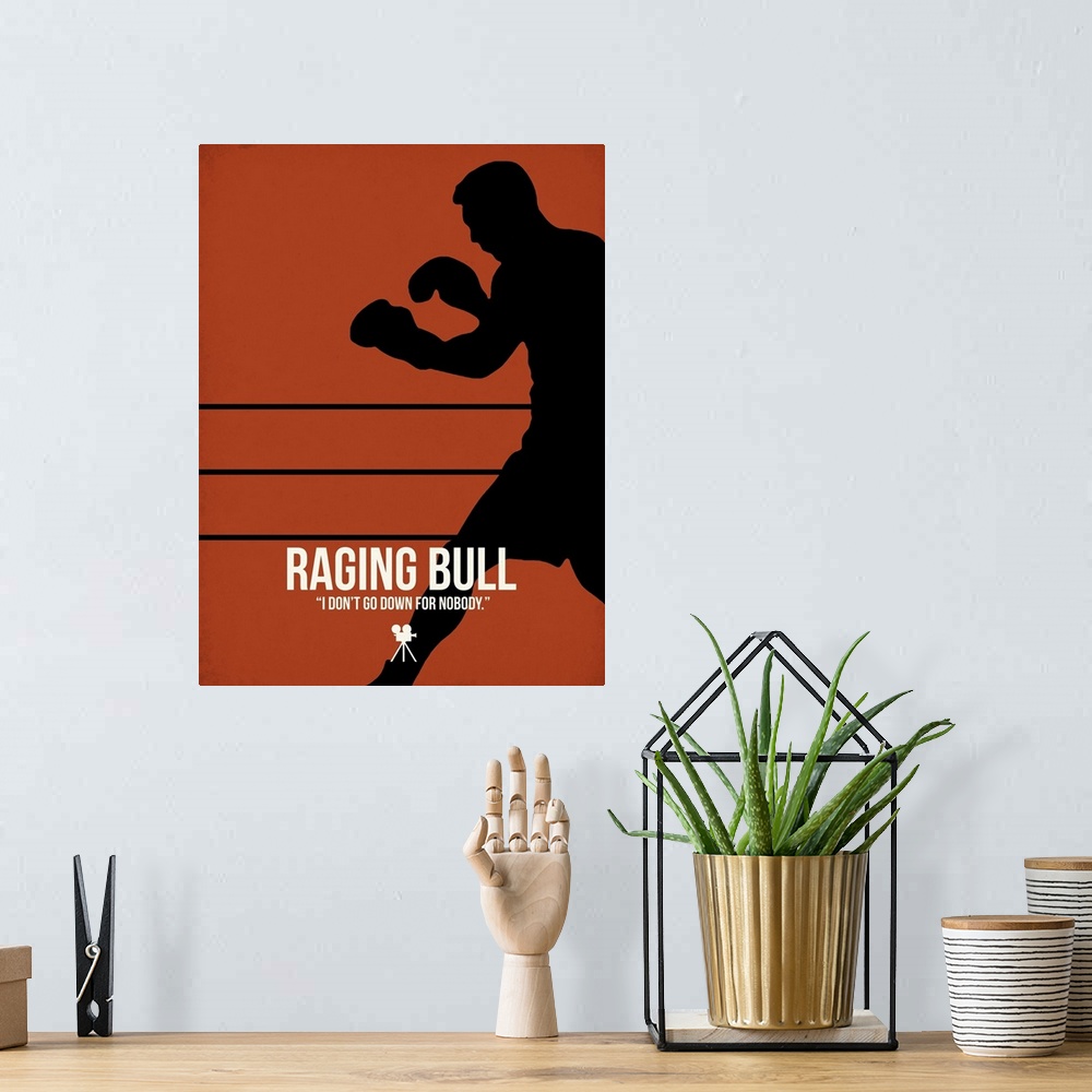 A bohemian room featuring Contemporary minimalist movie poster artwork of Raging Bull.