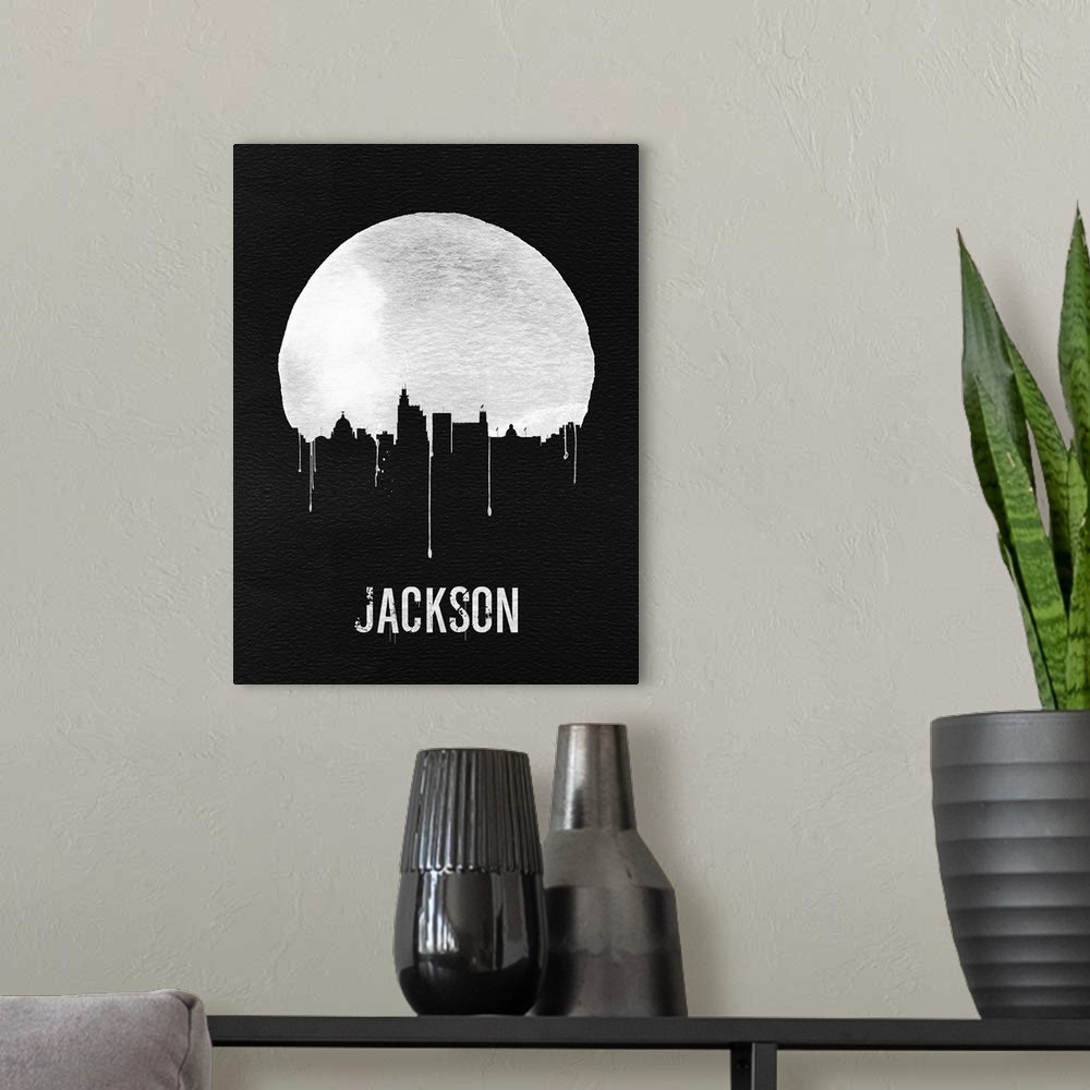A modern room featuring Contemporary watercolor artwork of the Jackson city skyline, in silhouette.