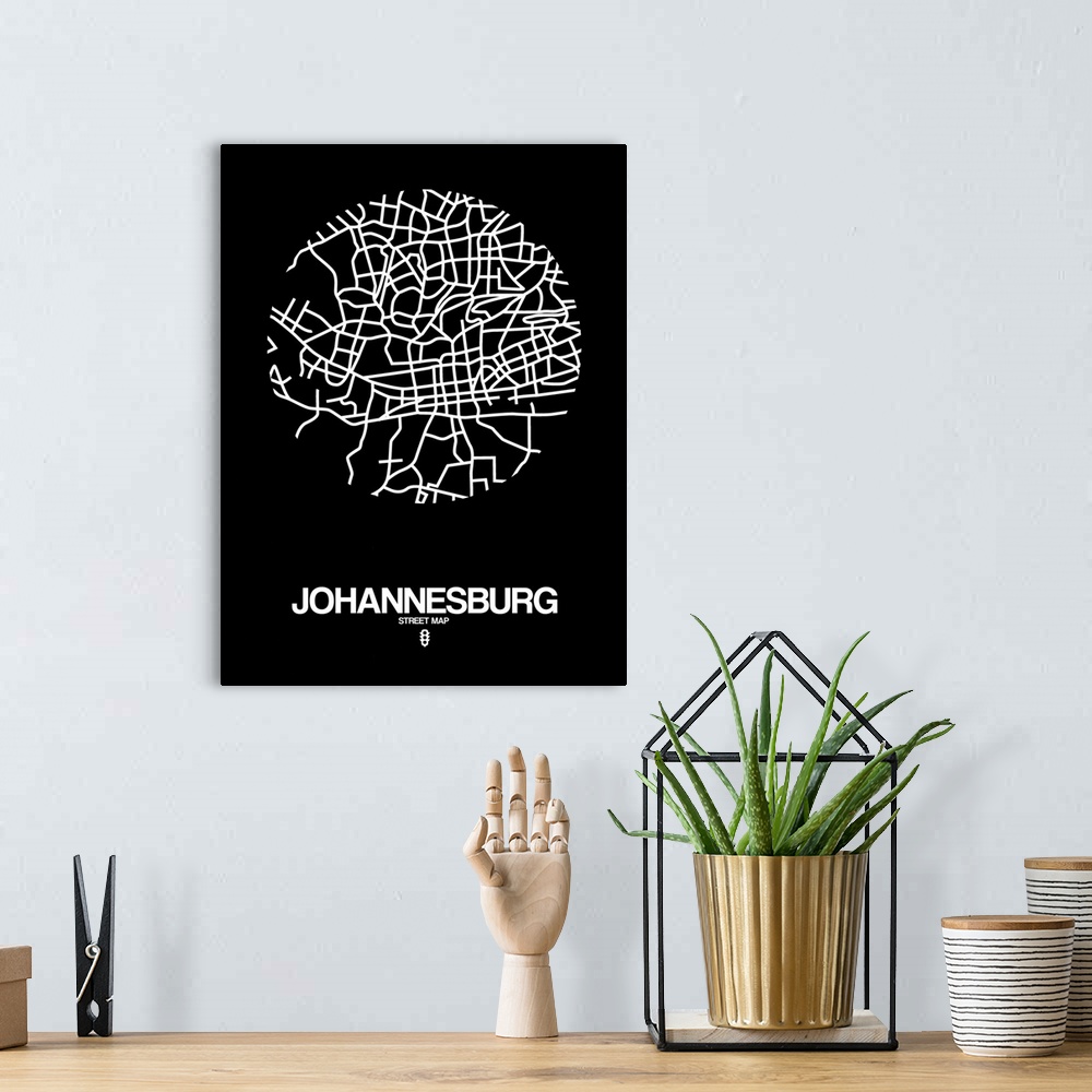 A bohemian room featuring Minimalist art map of the city streets of Johannesburg in black and white.