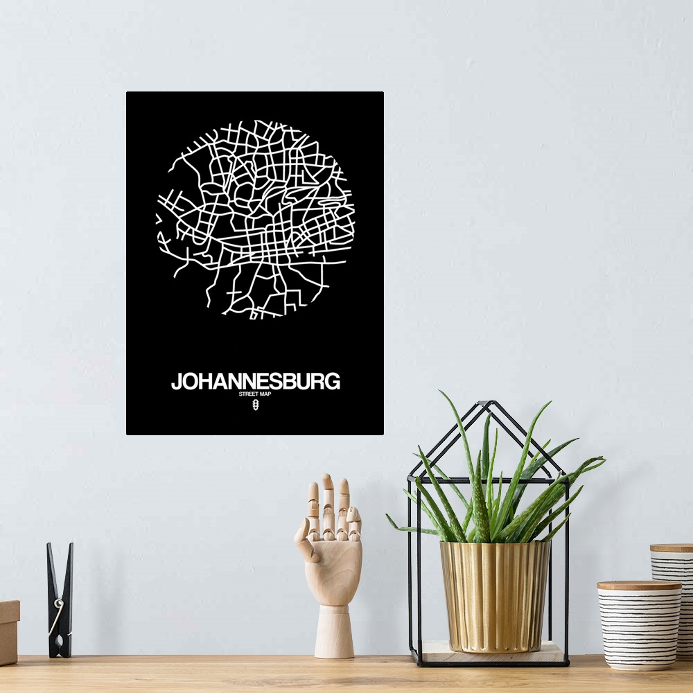 A bohemian room featuring Minimalist art map of the city streets of Johannesburg in black and white.