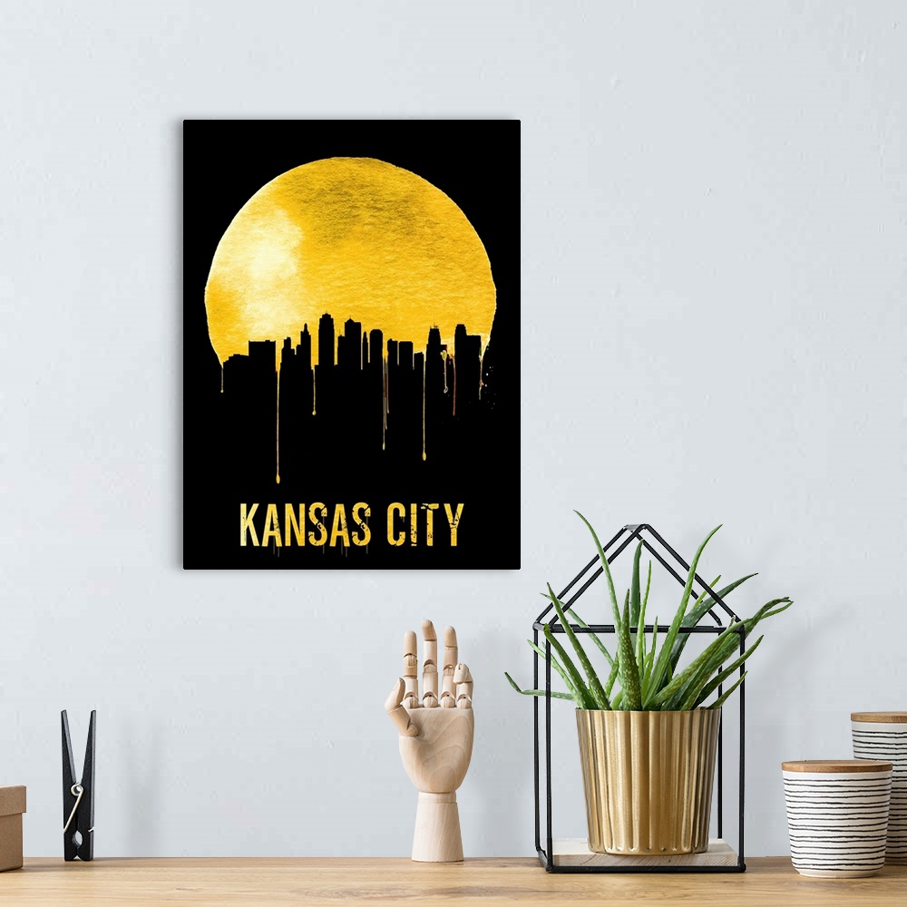 A bohemian room featuring Contemporary watercolor artwork of the Kansas city skyline, in silhouette.