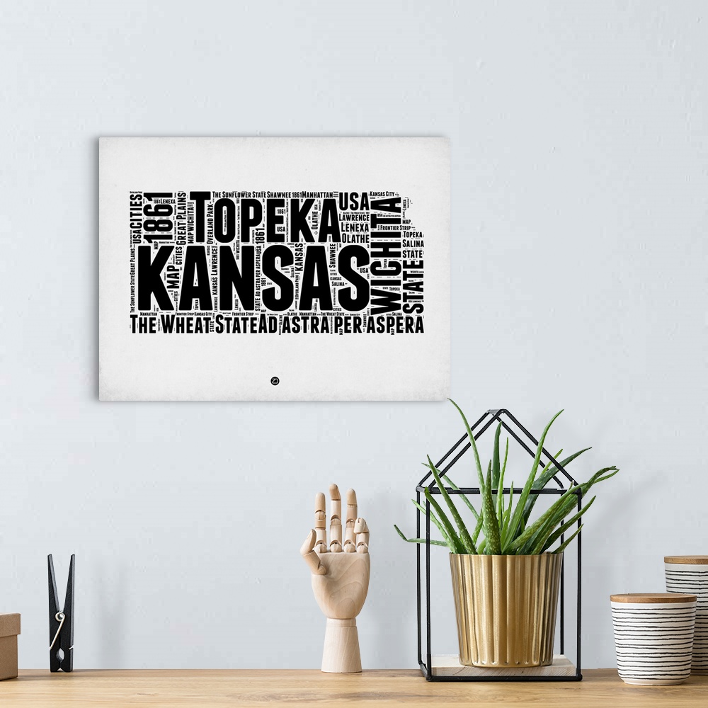 A bohemian room featuring Typography art map of the US state Kansas.