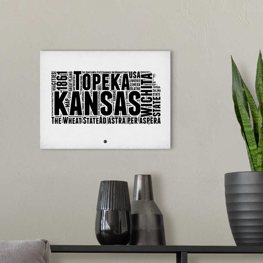 A modern room featuring Typography art map of the US state Kansas.