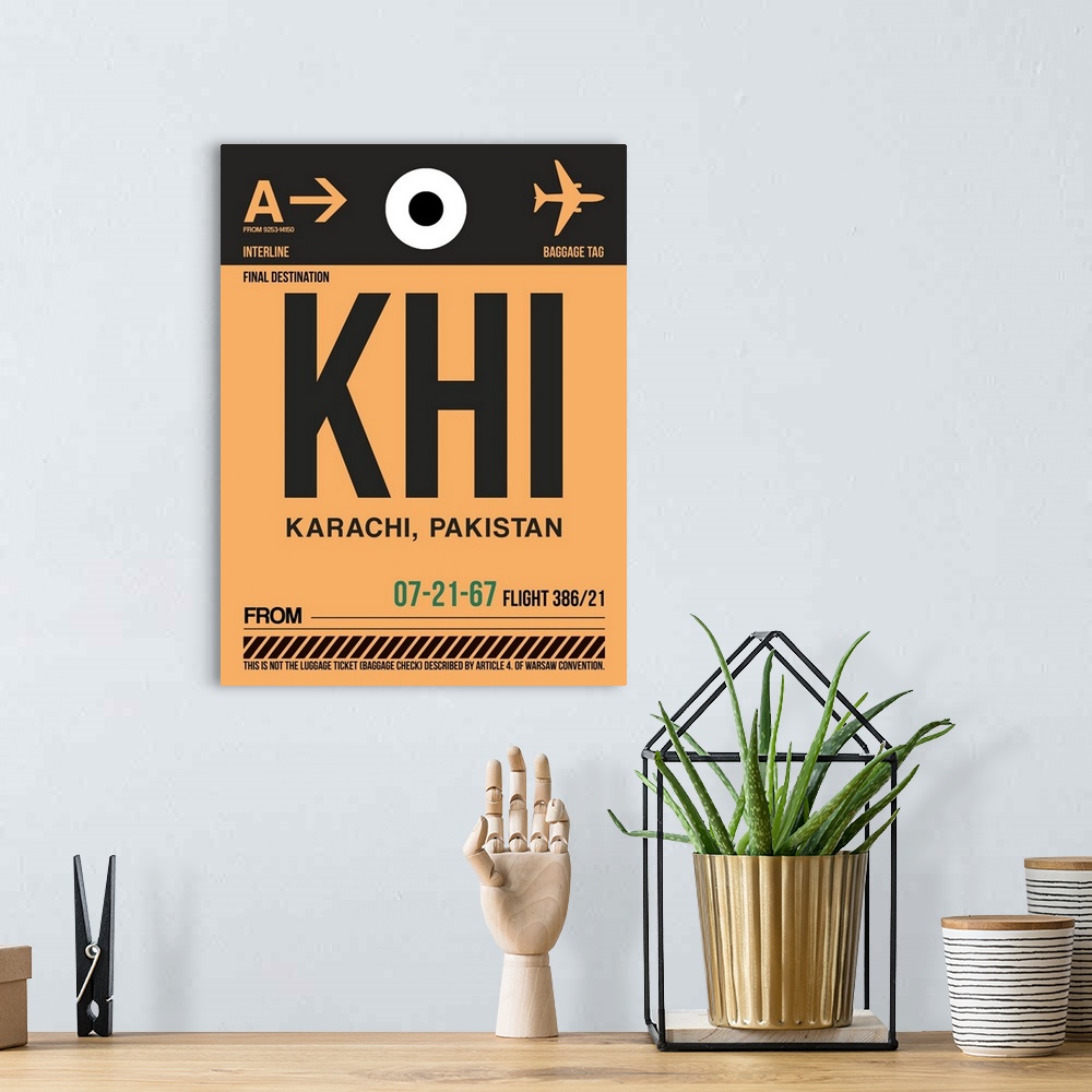 A bohemian room featuring KHI Karachi Luggage Tag I