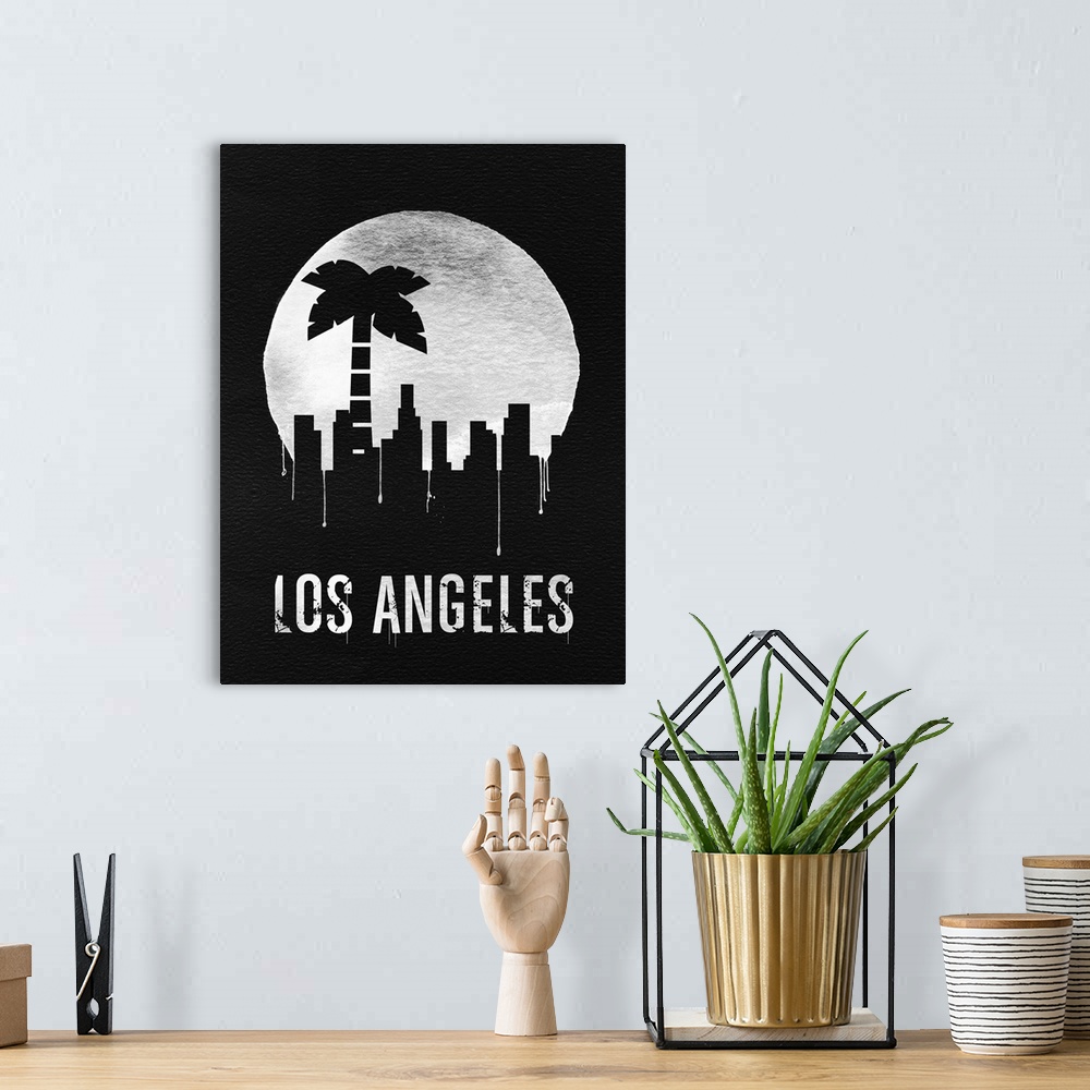 A bohemian room featuring Contemporary watercolor artwork of the Los Angeles skyline, in silhouette.