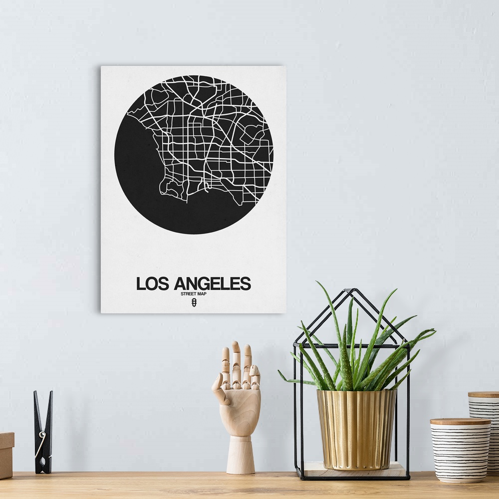 A bohemian room featuring Minimalist art map of the city streets of Los Angeles in white and black.