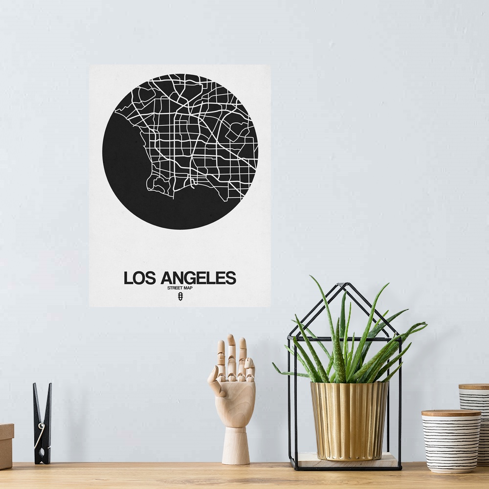 A bohemian room featuring Minimalist art map of the city streets of Los Angeles in white and black.