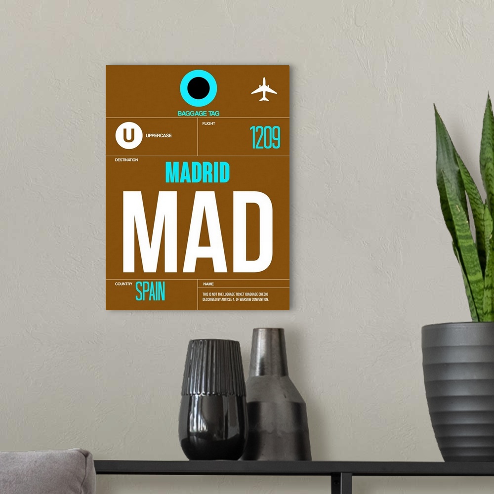 A modern room featuring MAD Madrid Luggage Tag I