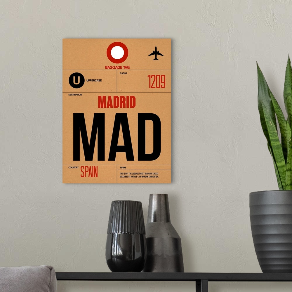 A modern room featuring MAD Madrid Luggage Tag II