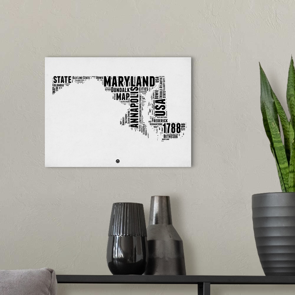A modern room featuring Black and white art map of the US state Maryland.