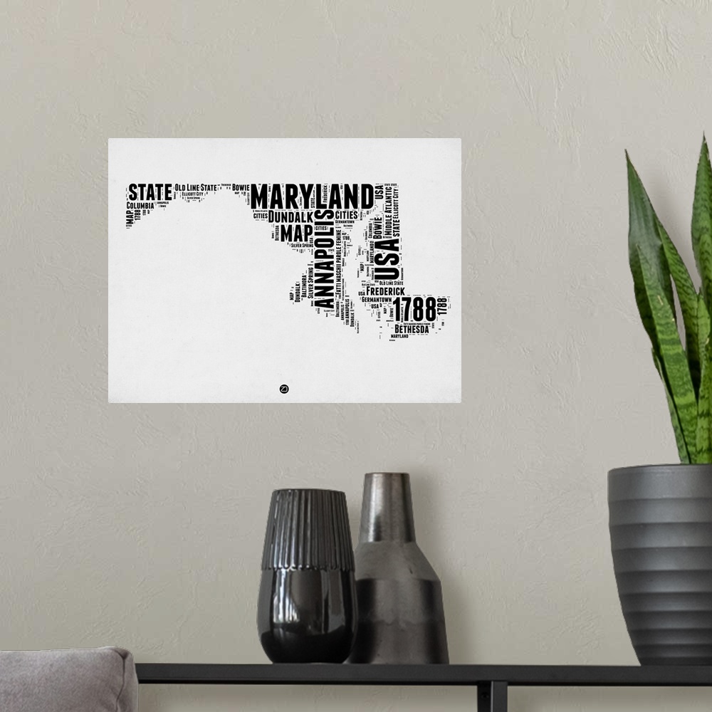A modern room featuring Black and white art map of the US state Maryland.