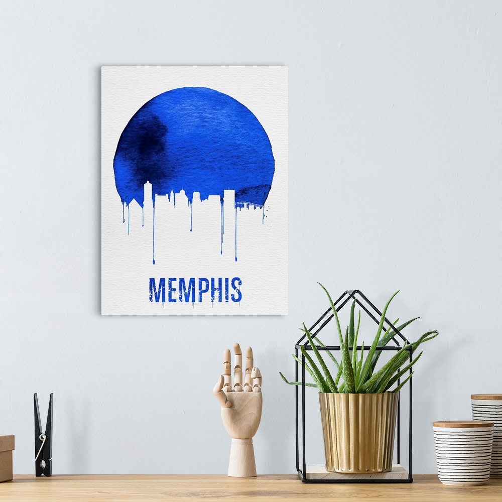 A bohemian room featuring Contemporary watercolor artwork of the Memphis city skyline, in silhouette.