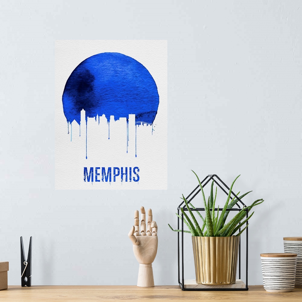 A bohemian room featuring Contemporary watercolor artwork of the Memphis city skyline, in silhouette.