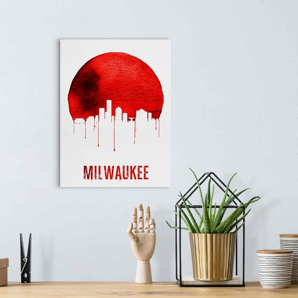 A bohemian room featuring Contemporary watercolor artwork of the Milwaukee city skyline, in silhouette.