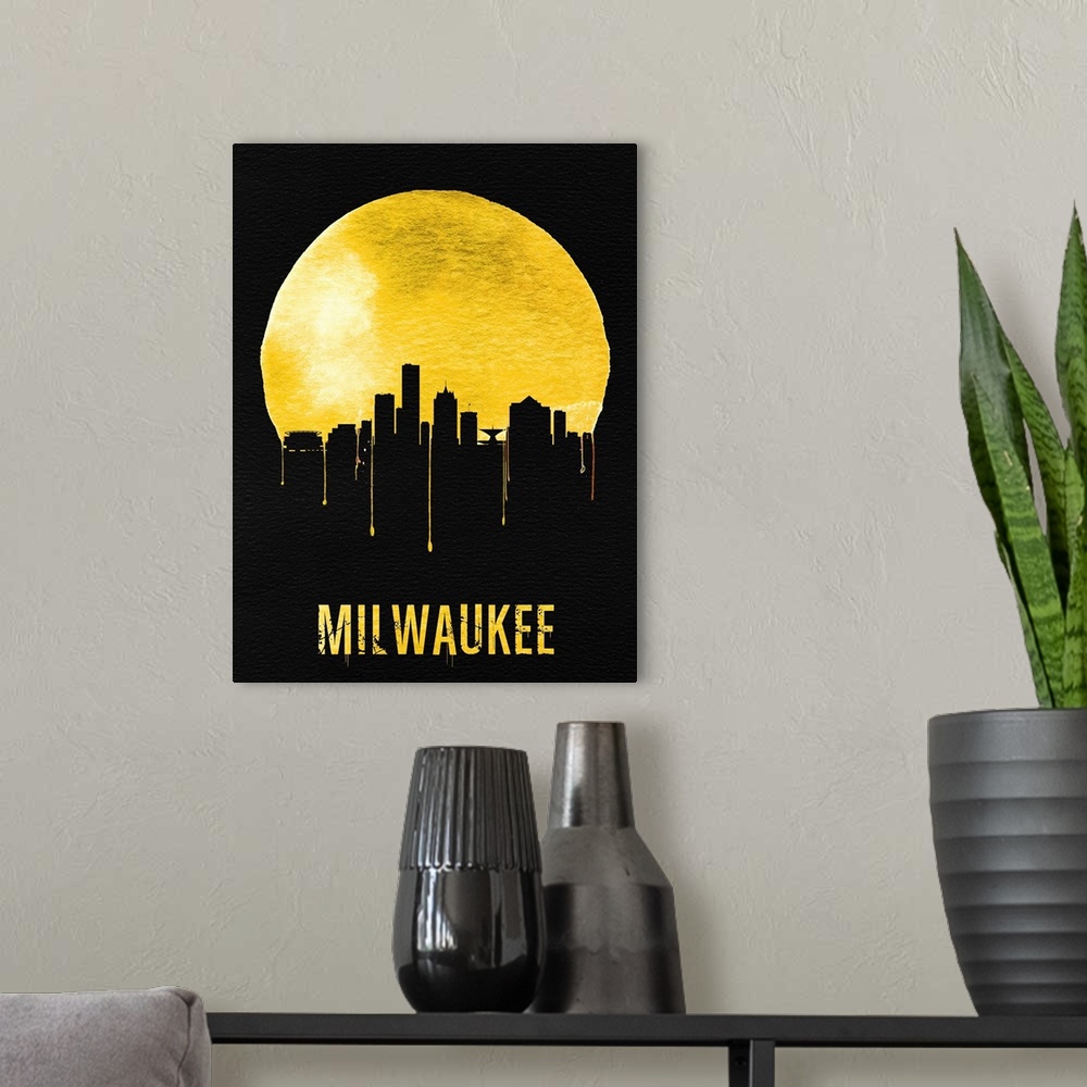 A modern room featuring Contemporary watercolor artwork of the Milwaukee city skyline, in silhouette.