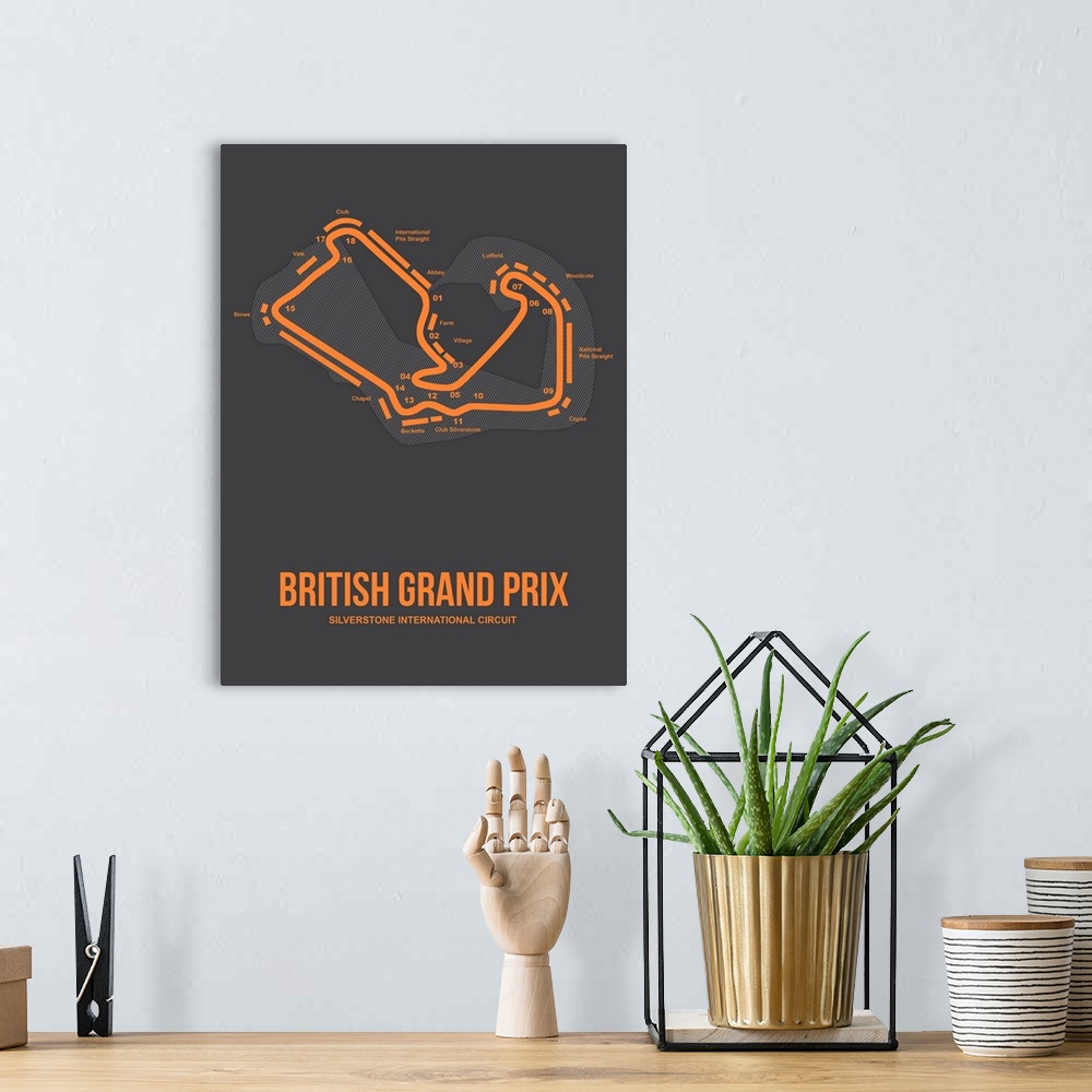 A bohemian room featuring Minimalist British Grand Prix Poster III