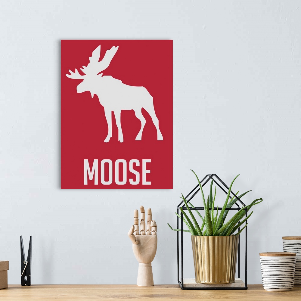 A bohemian room featuring Minimalist Wildlife Poster - Moose - Red