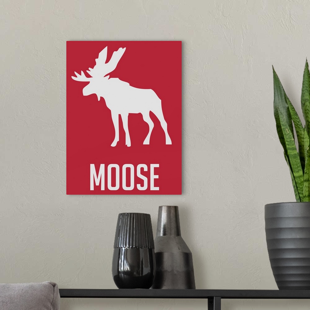 A modern room featuring Minimalist Wildlife Poster - Moose - Red