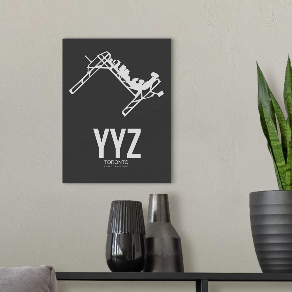 A modern room featuring Minimalist YYZ Toronto Poster III