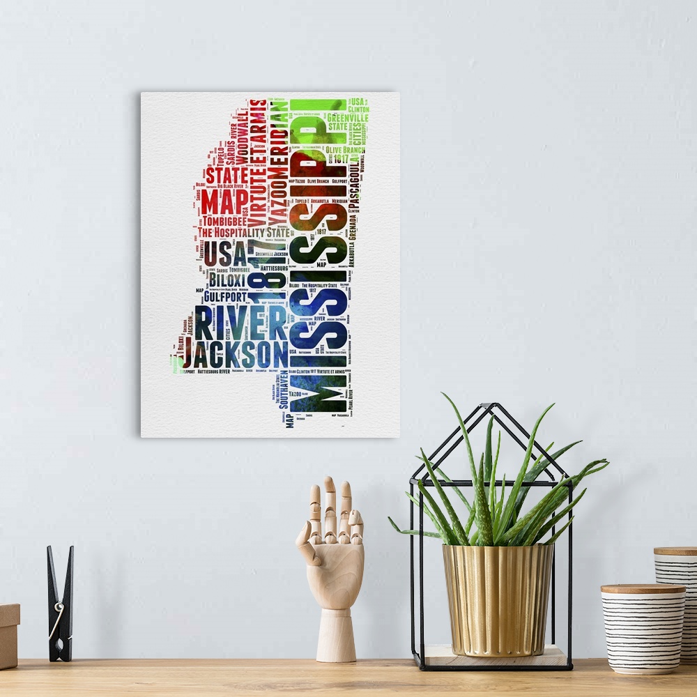 A bohemian room featuring Watercolor typography art map of the US state Mississippi.