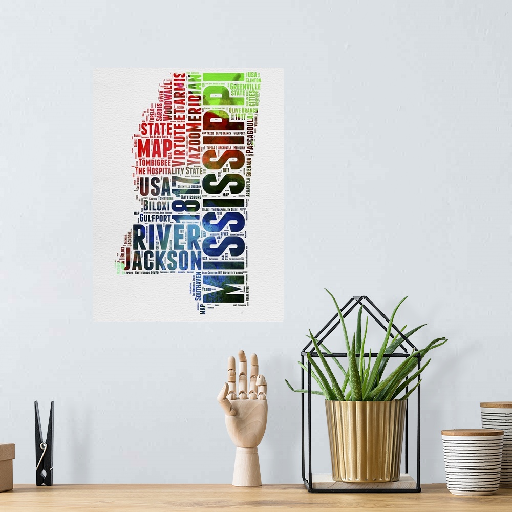 A bohemian room featuring Watercolor typography art map of the US state Mississippi.