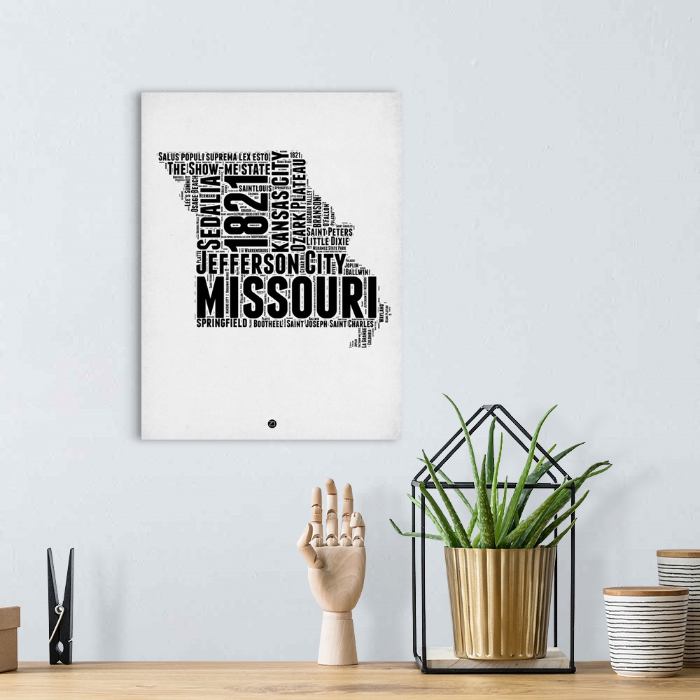 A bohemian room featuring Typography art map of the US state Missouri.