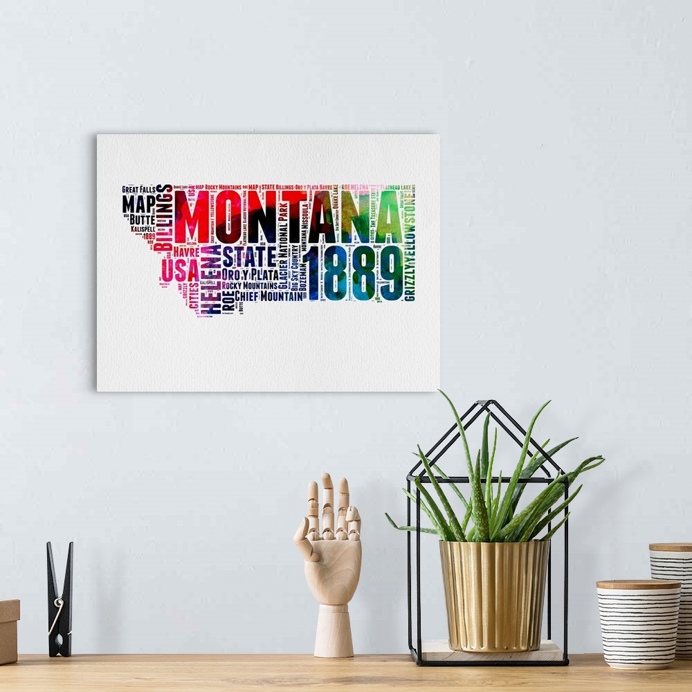 A bohemian room featuring Watercolor typography art map of the US state Montana.