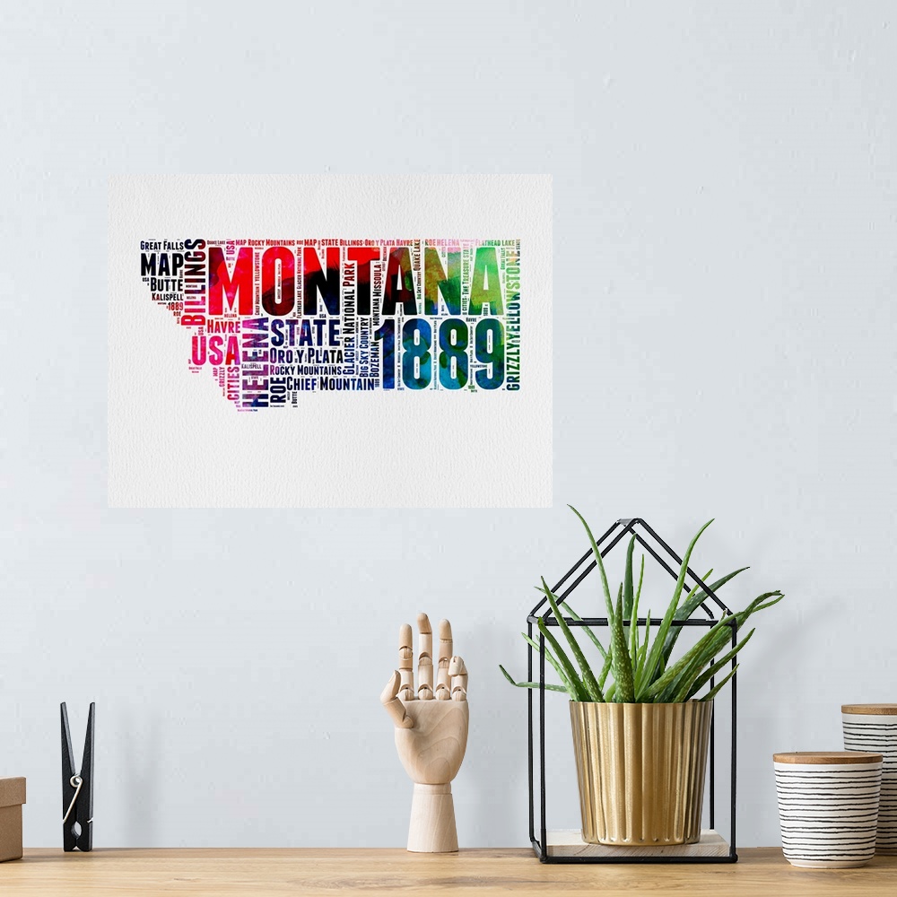 A bohemian room featuring Watercolor typography art map of the US state Montana.