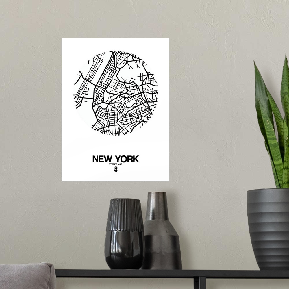 A modern room featuring Minimalist art map of the city streets of New York City in white and black.